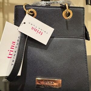 Trina Turk Black Bag with Gold Accents
